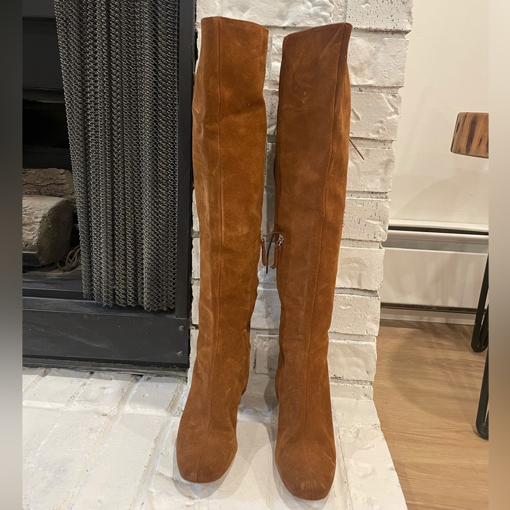Heeled leather knee high boots